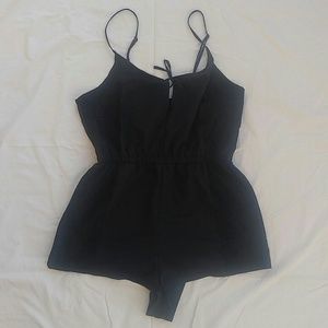 Black romper with lace overlay